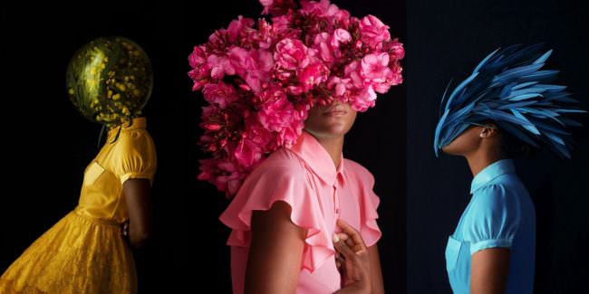 drei Frauen mit bunten Blütenmasken